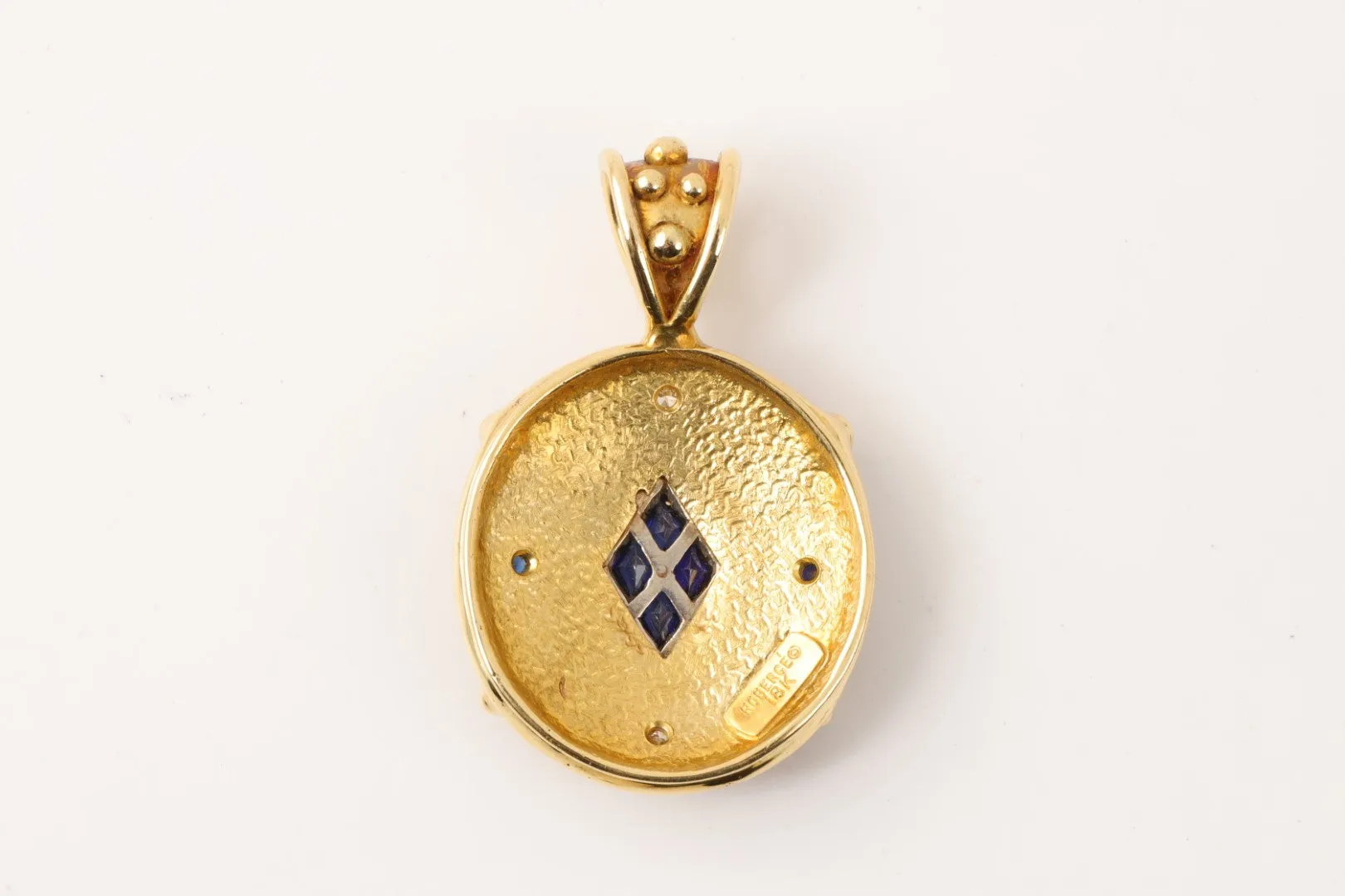 18k Yellow Gold Pendant with 0.28tcw Diamonds and 0.92tcw Sapphires (22.18g.)